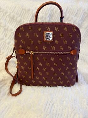 Dooney & Bourke Burgundy Monogram Backpack with Brown Trim